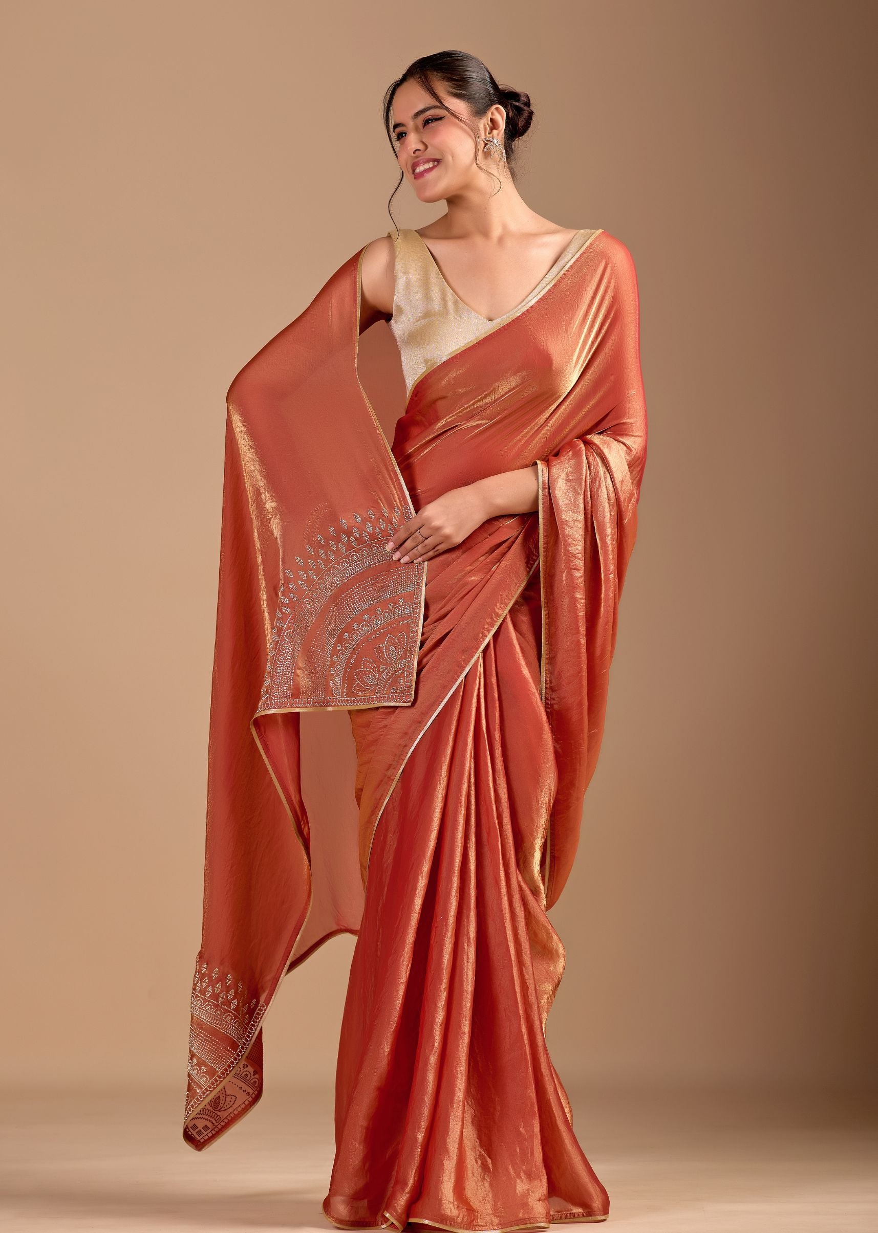 Peach Orange Organza Saree with Stone Work Border & Metallic Sheen