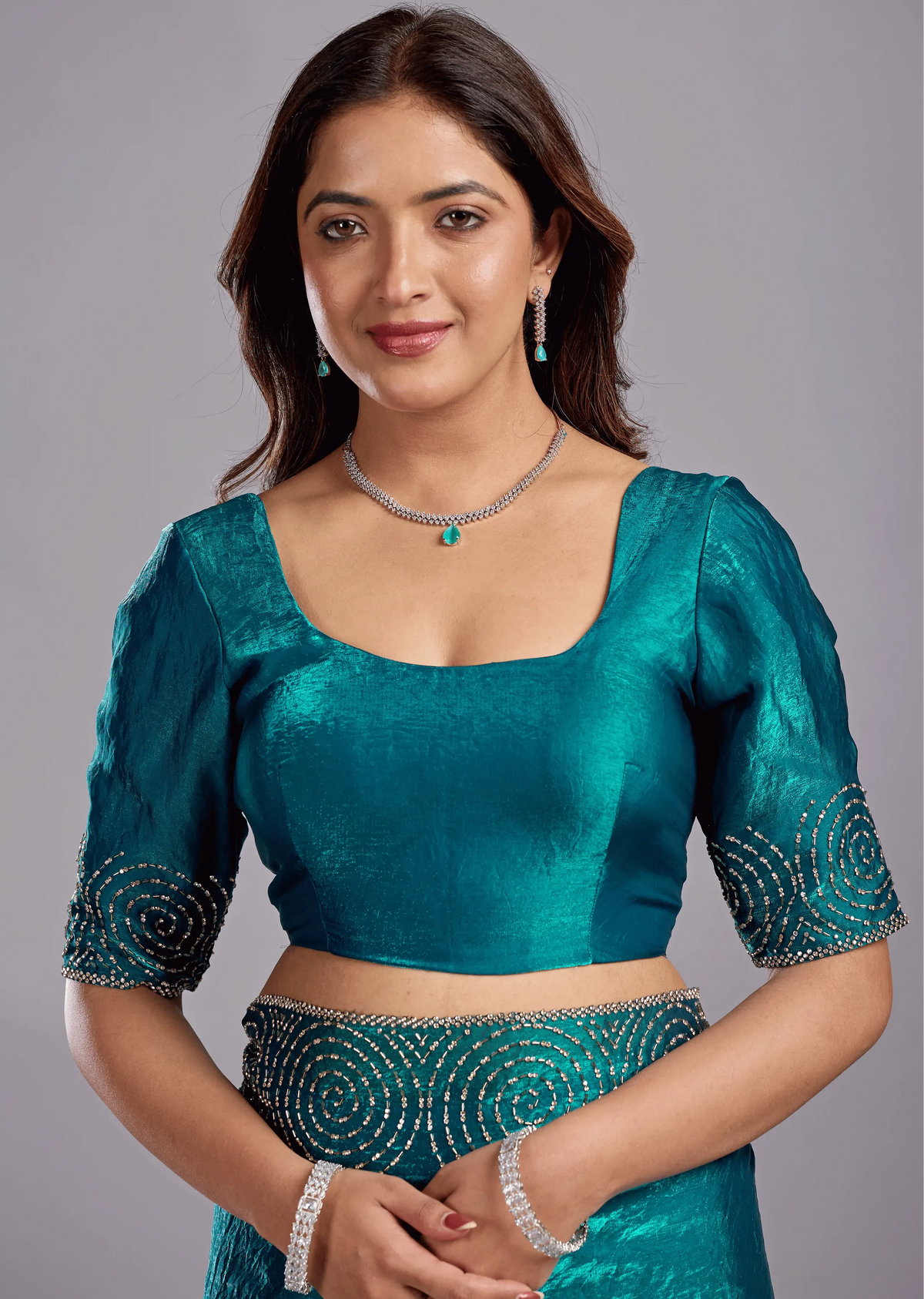 Peacock Teal Tissue Silk Saree With Crystal Spiral Work