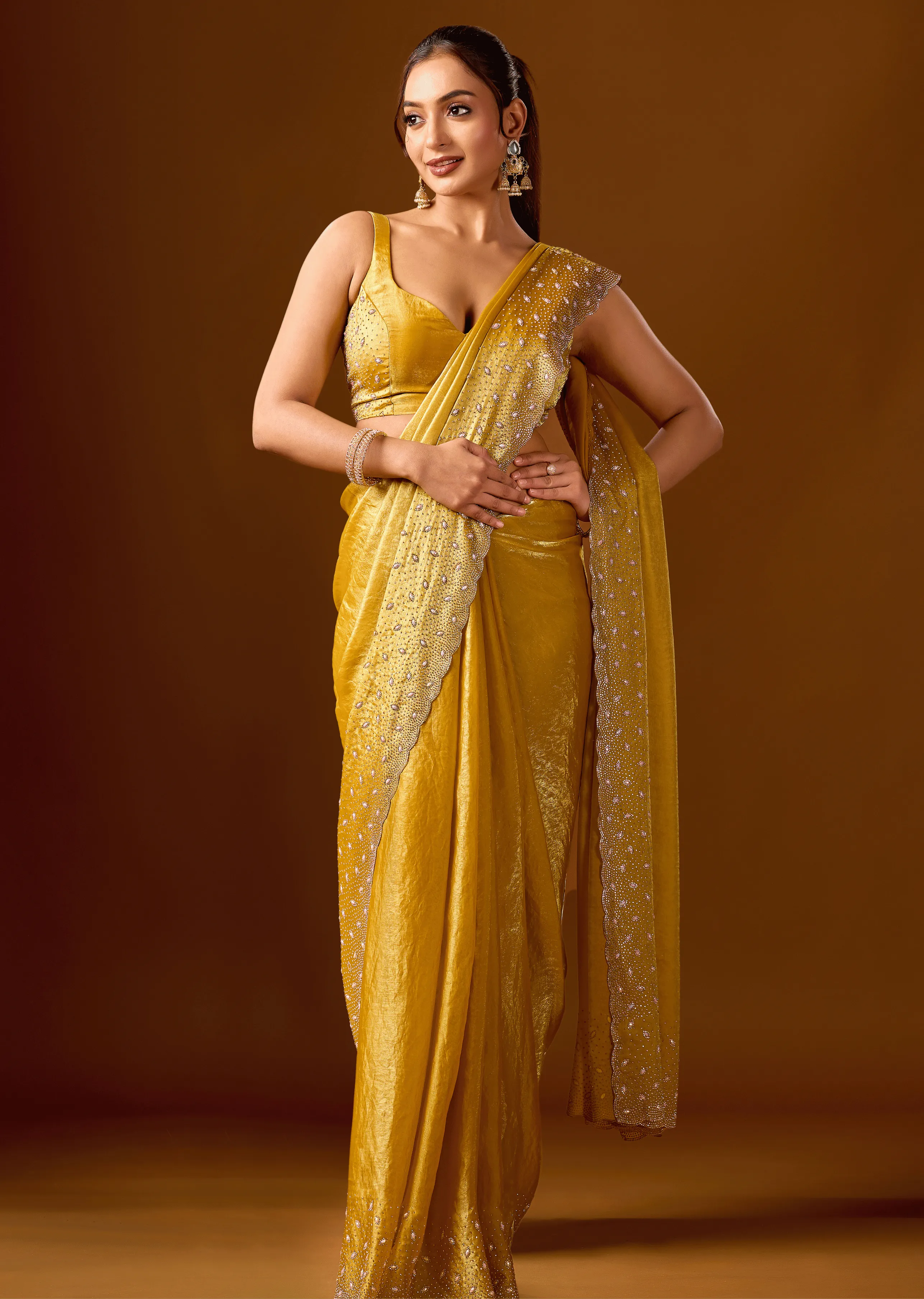  Mustard Yellow Tissue Silk Saree With Stone Work - Front Look | Buy On Ethnic9
