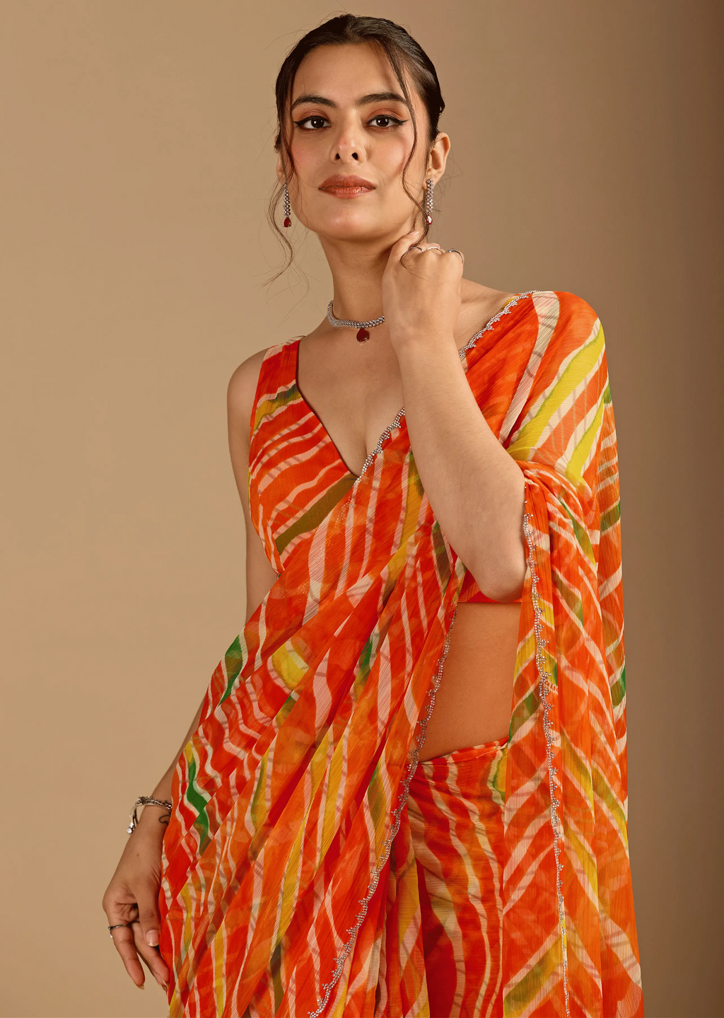 Orange Chiffon Saree Close Up Pose - Stone Work Detailing