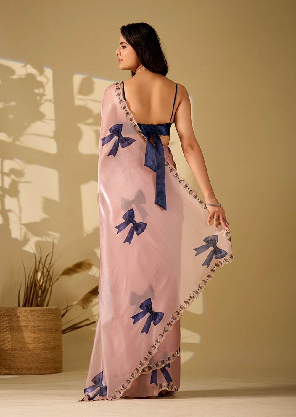 pink bow print saree back view with blouse