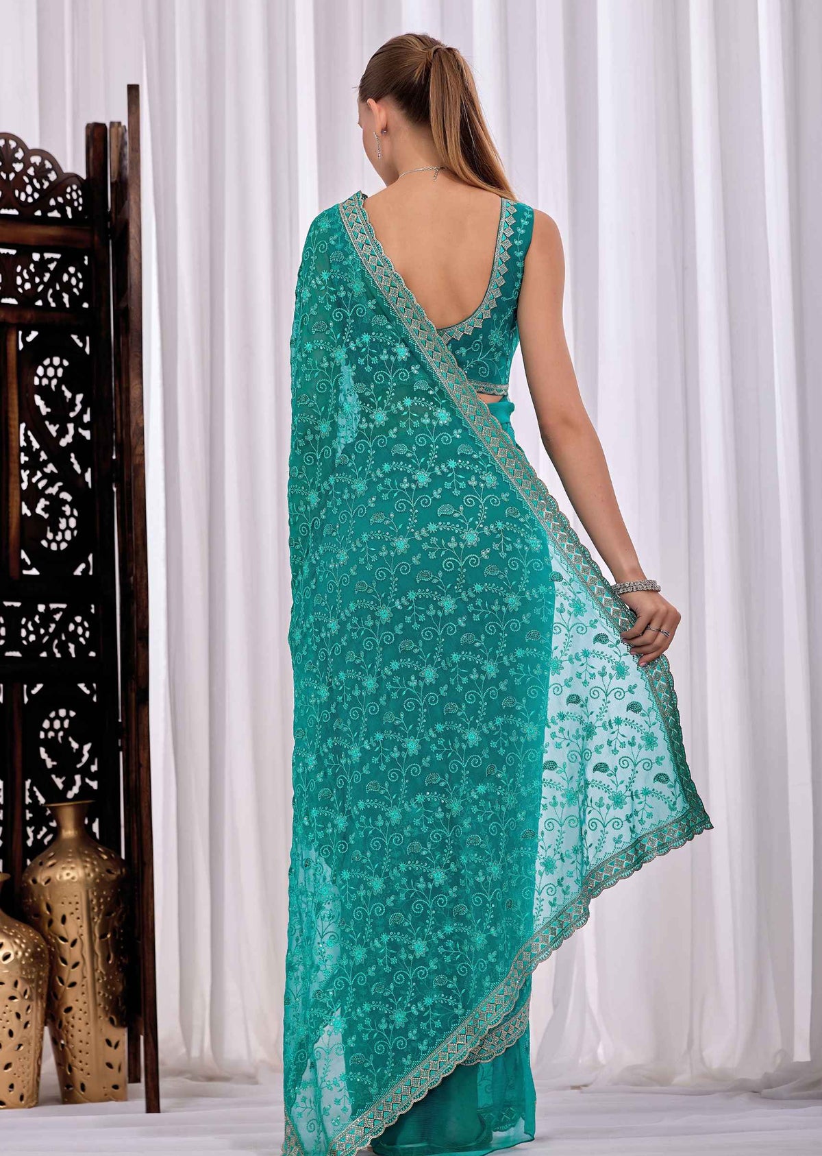 Firozi Chiffon Saree With Floral Embroidery And Stone Border