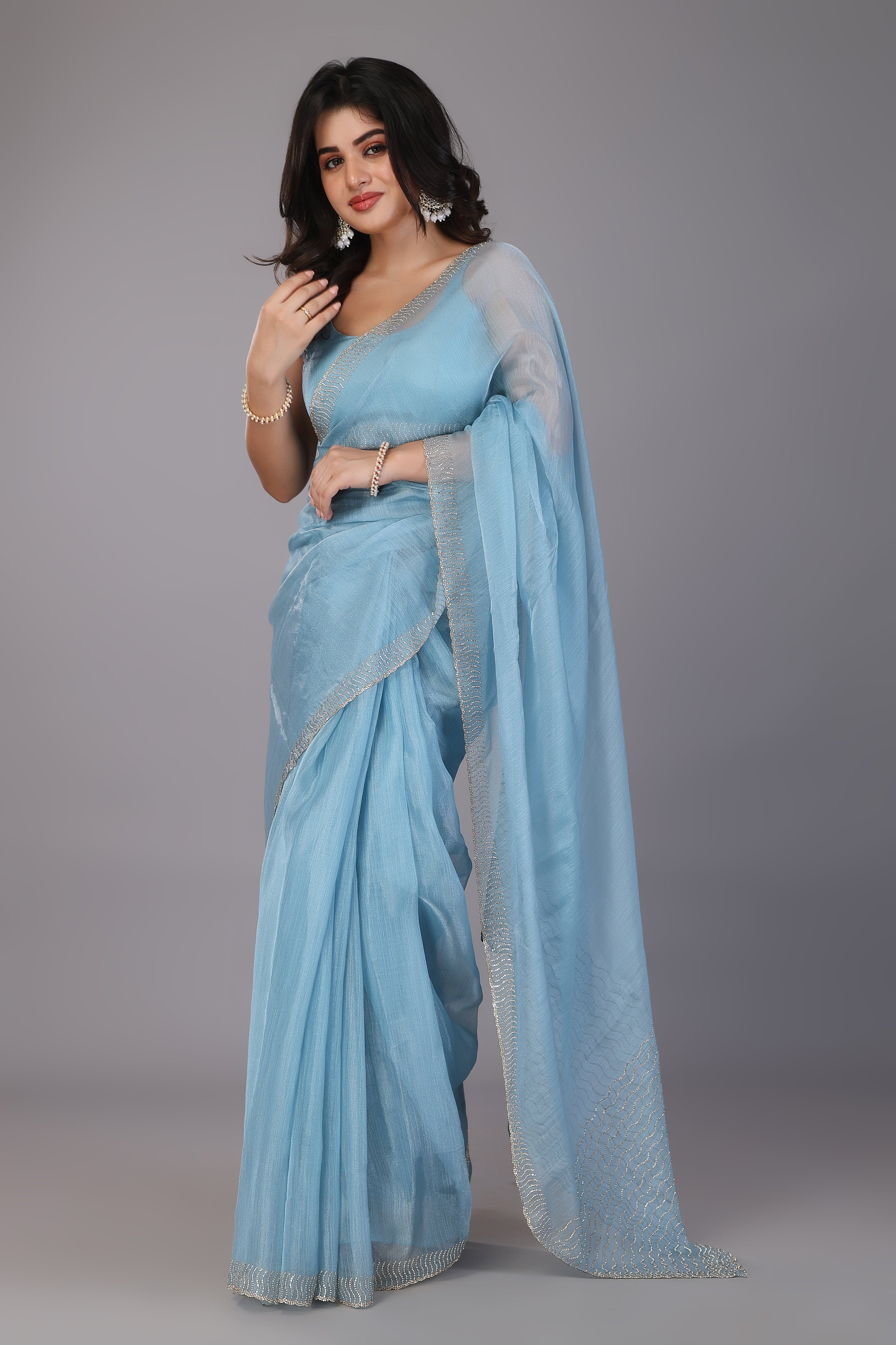 Sky blue stone work soft net saree