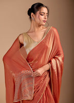 Peach Orange Organza Saree with Stone Work Border & Metallic Sheen