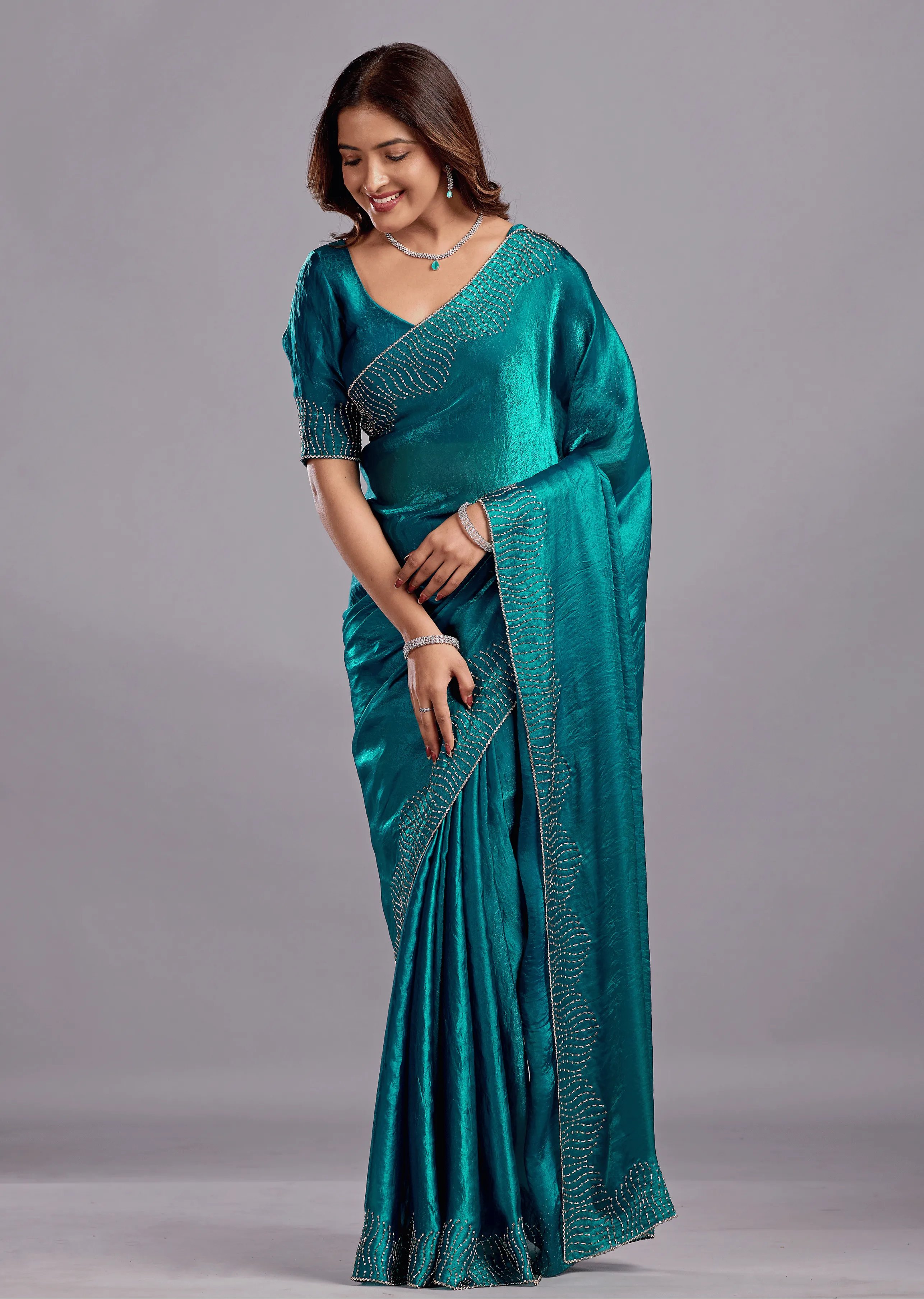 Teal Blue Tissue Silk Saree Close Up Pose - Reception Wear Saree