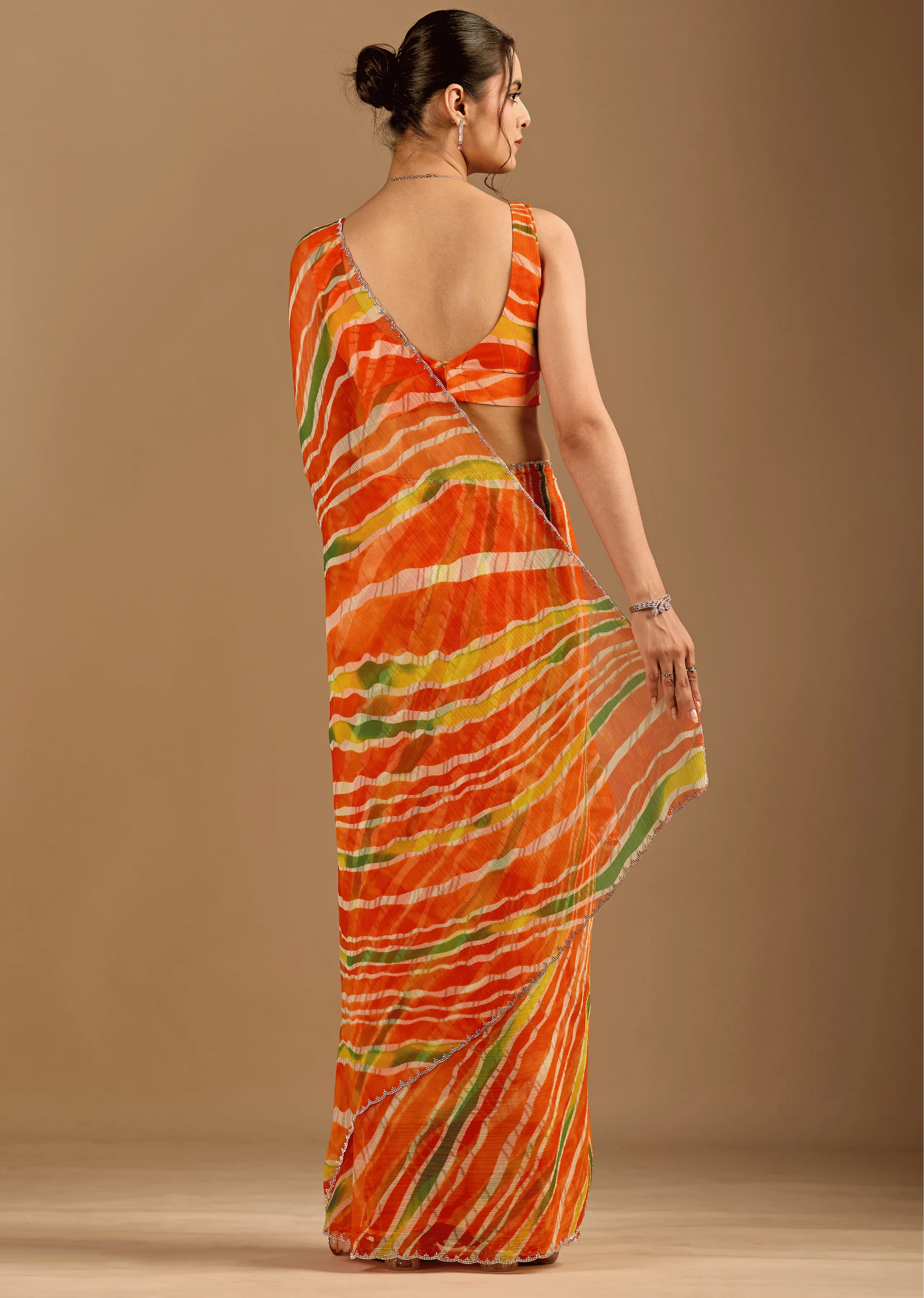 Orange Chiffon Saree Back Pose - Stone Work Detail
