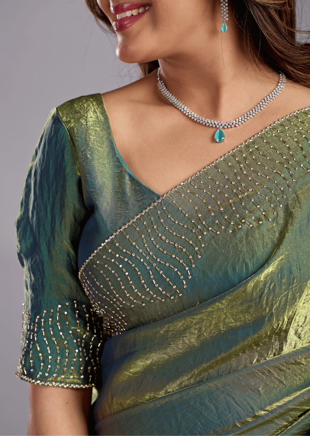 Olive Green Tissue Silk Saree Close Up Pose - Reception Wear Saree