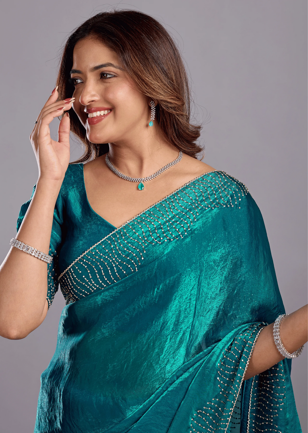 Teal Blue Tissue Silk Saree Close Up Pose - Reception Wear Saree