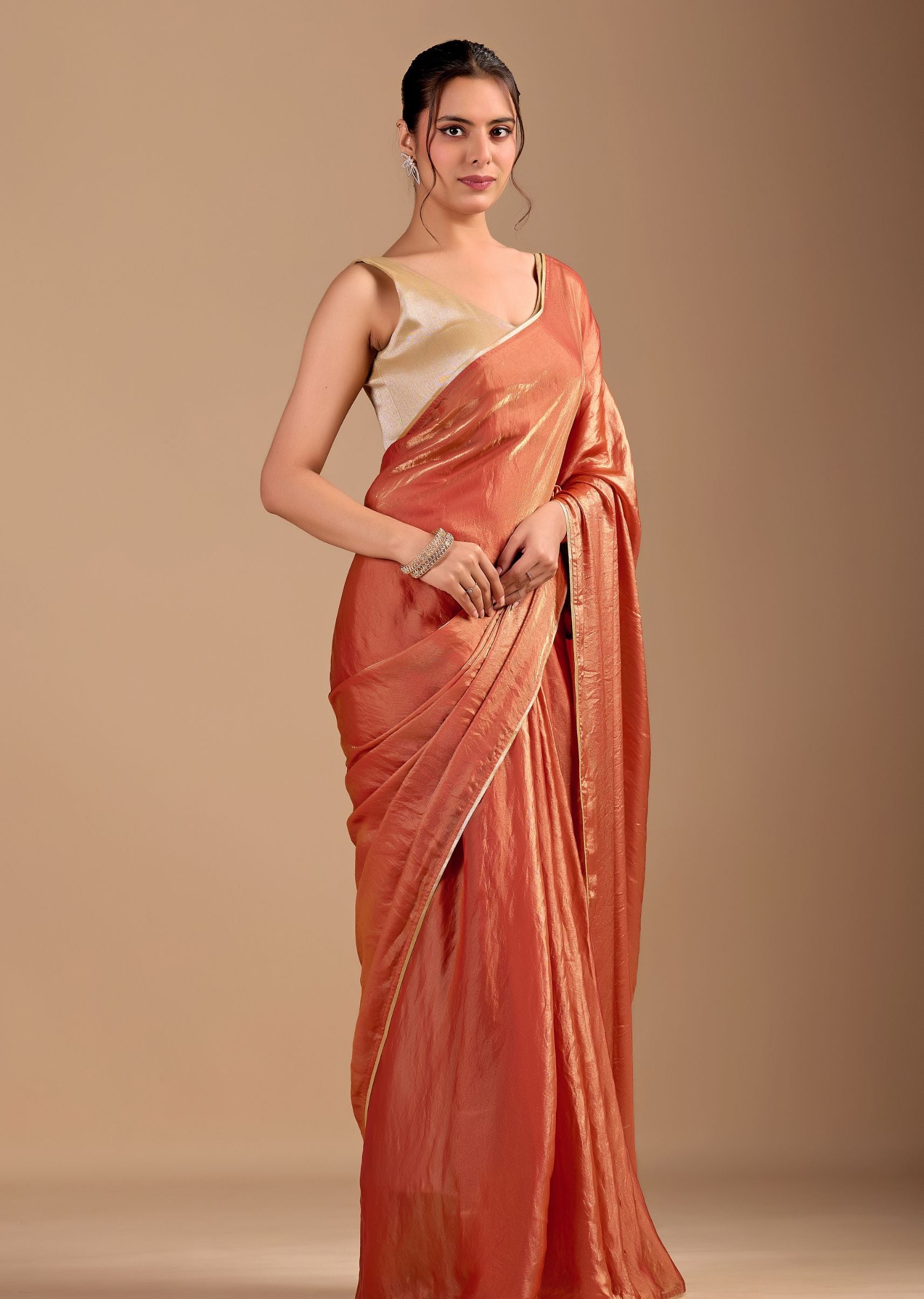 Peach Orange Organza Saree with Stone Work Border & Metallic Sheen