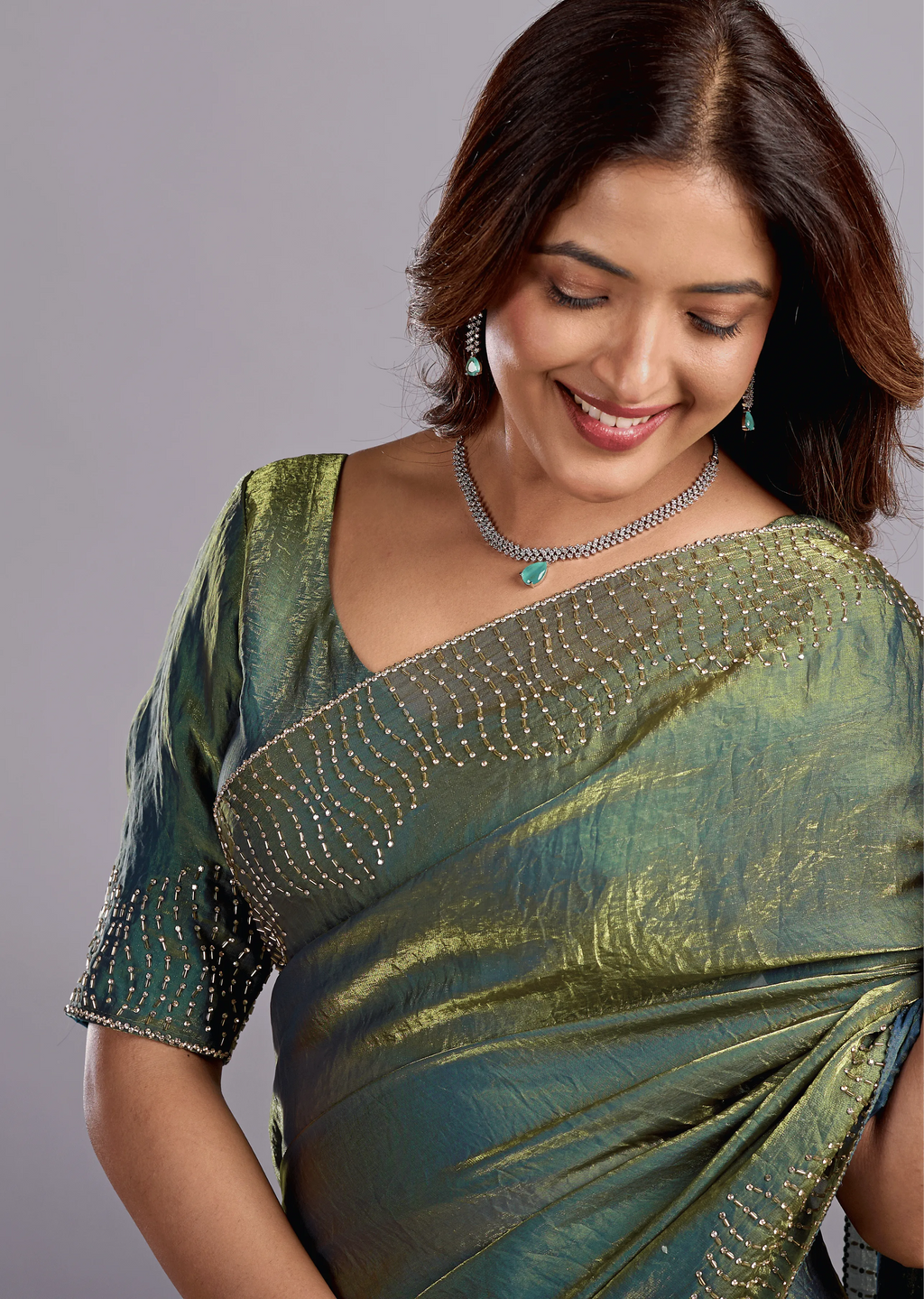 Olive Green Tissue Silk Saree Close Up Pose - Reception Wear Saree
