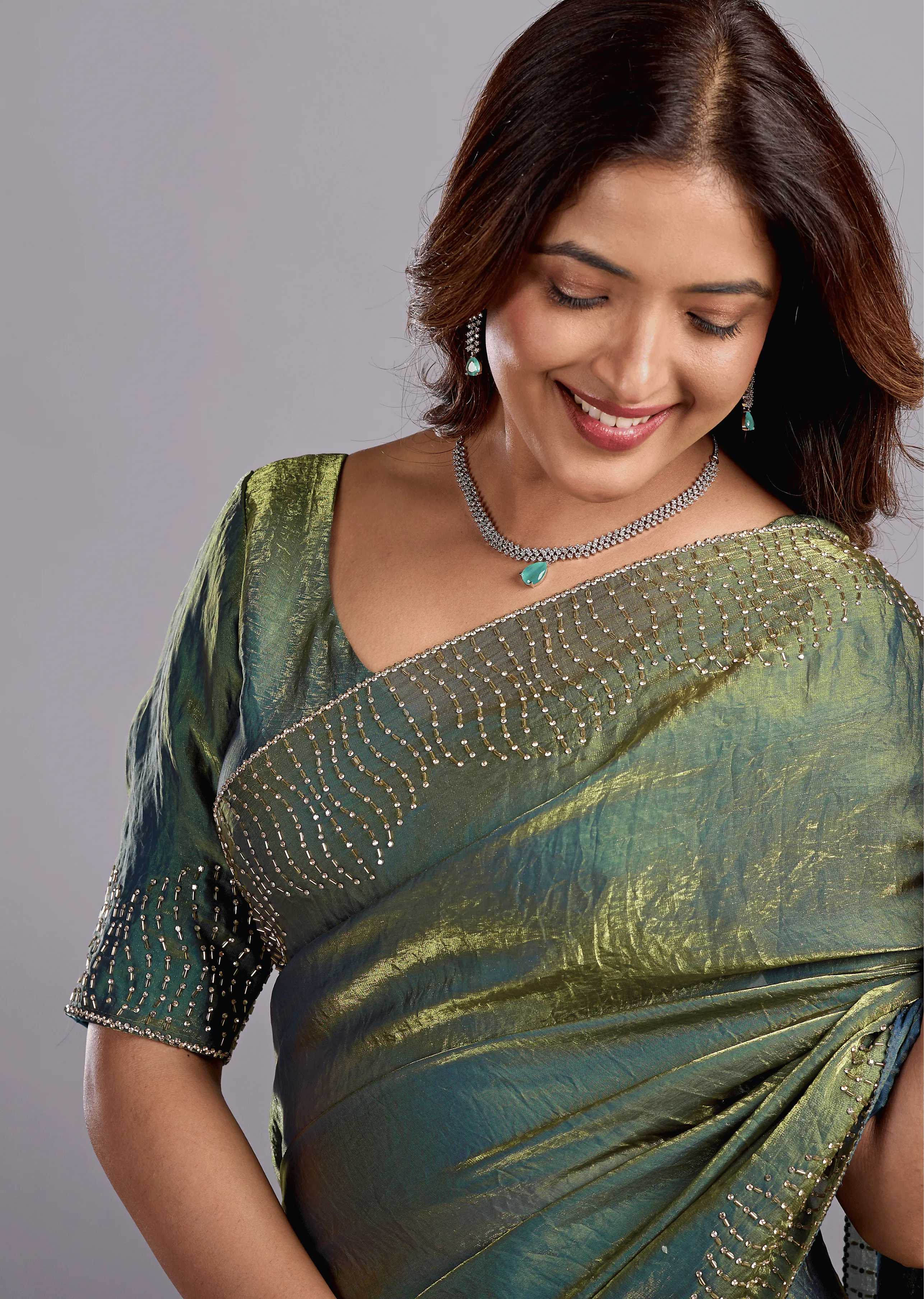 Olive Green Tissue Silk Saree Close Up Pose - Reception Wear Saree