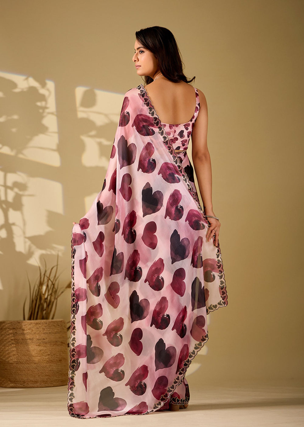 pink heart print saree back view with pallu draped
