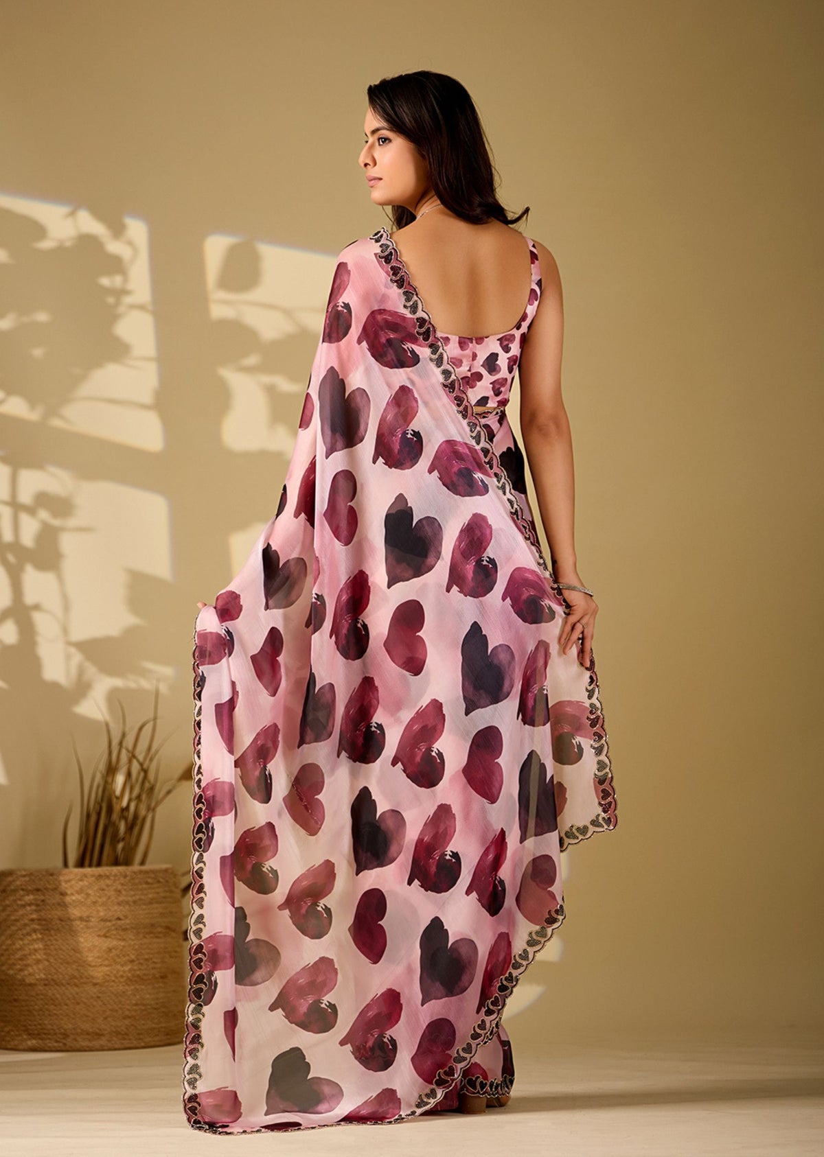 pink heart print saree back view with pallu draped