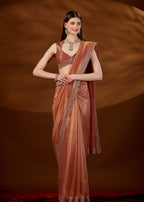 Peach Orange Tissue Saree Draped Pose - Festive Wear Saree