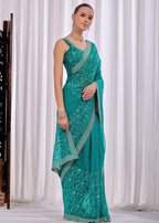 Firozi Chiffon Saree With Floral Embroidery And Stone Border