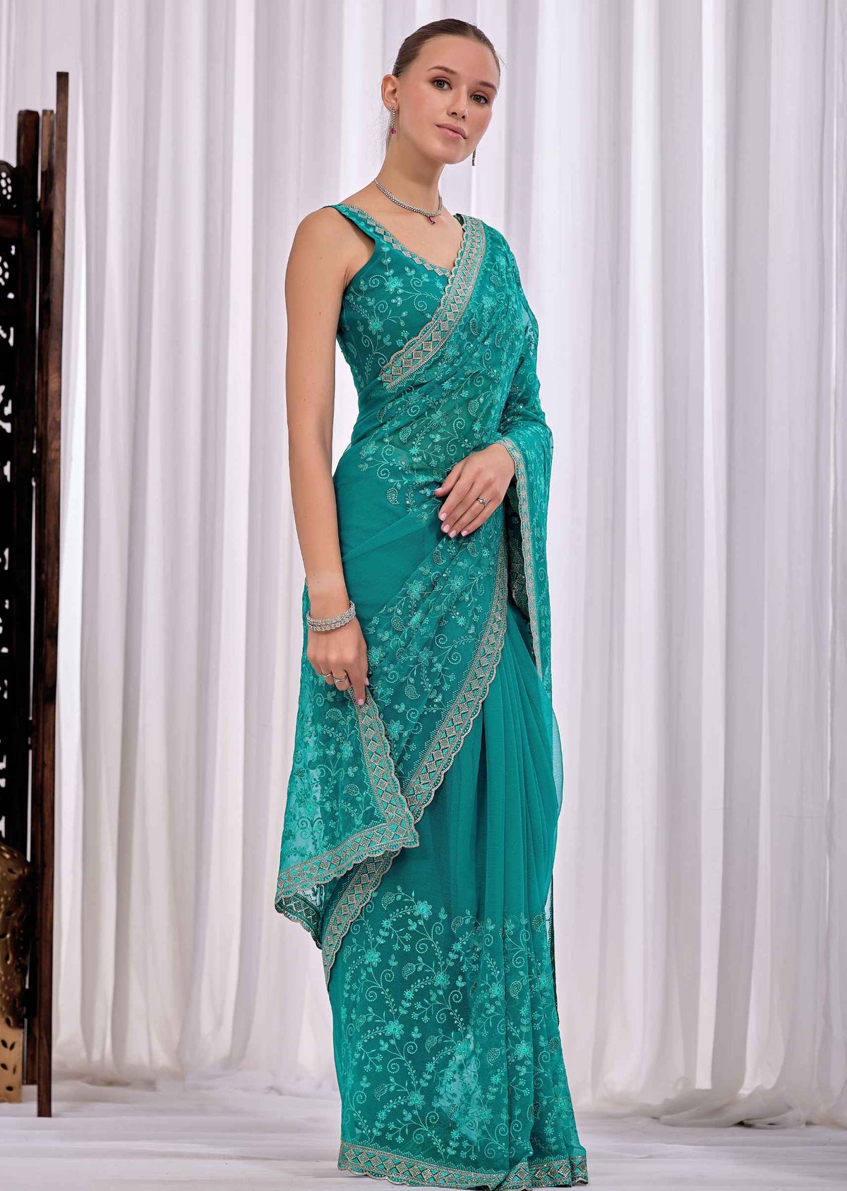 Firozi Chiffon Saree With Floral Embroidery And Stone Border