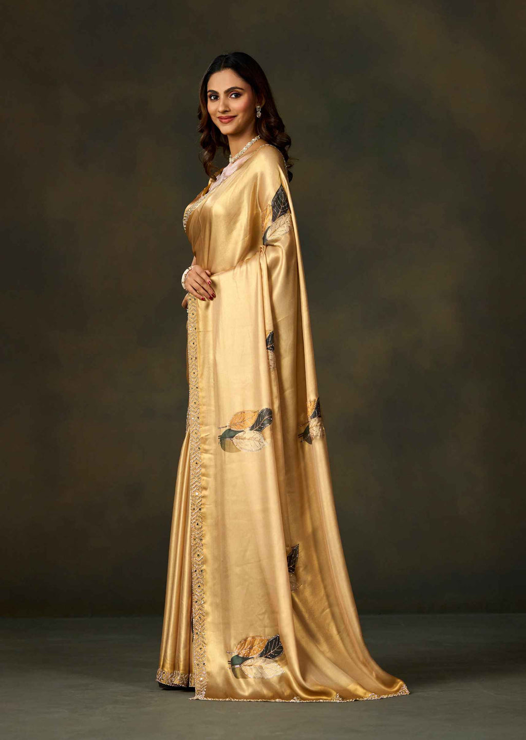 Golden Satin Silk Saree With Leaf Motifs And Embellished Border
