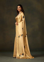 Golden Satin Silk Saree With Leaf Motifs And Embellished Border