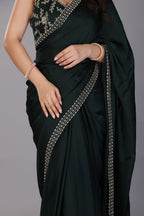 Dark green stone work pure satin saree
