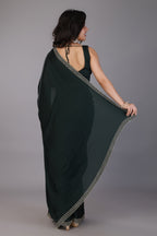 Dark green stone work pure satin saree