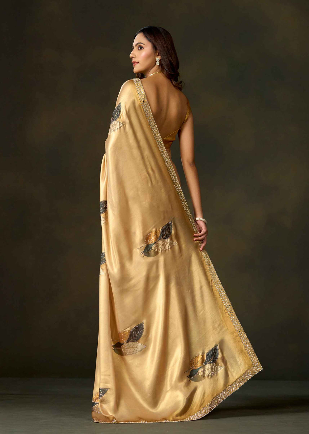 Golden Satin Silk Saree With Leaf Motifs And Embellished Border
