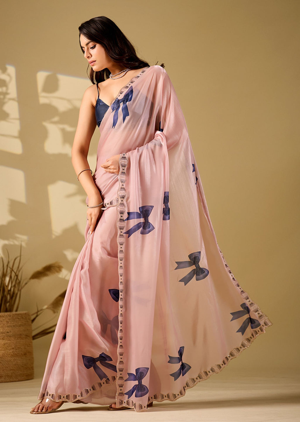 pink bow print saree side walking pose