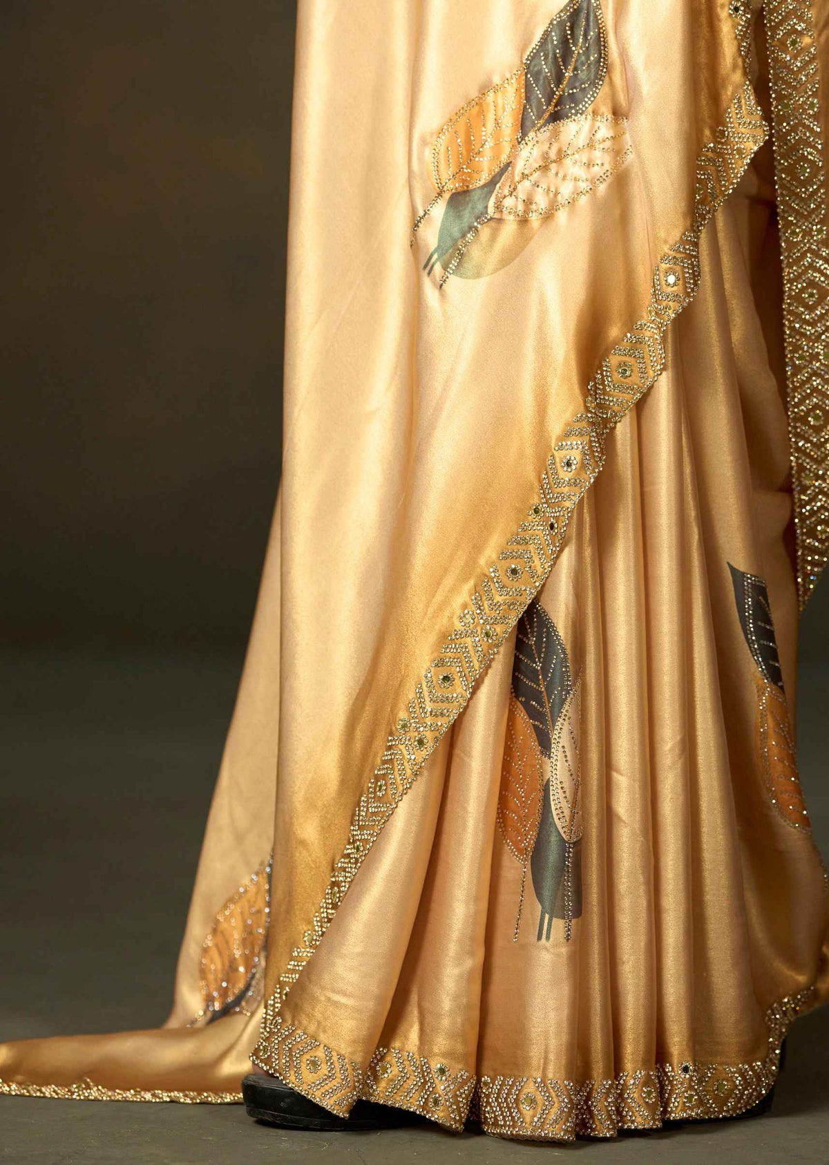 Golden Satin Silk Saree With Leaf Motifs And Embellished Border