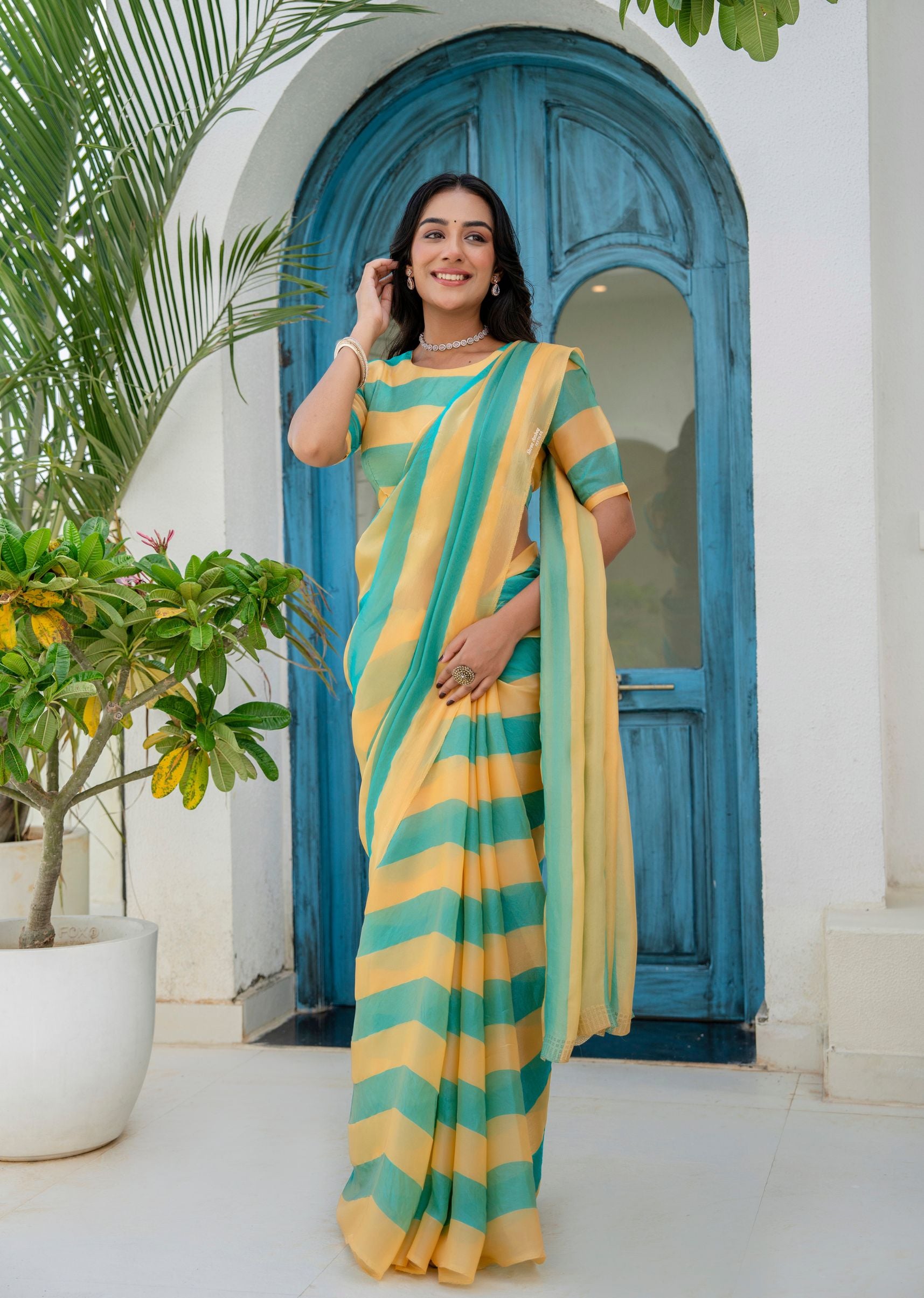 Sky Blue Organza Saree Outdoor Styled Look - Festive Wear Saree