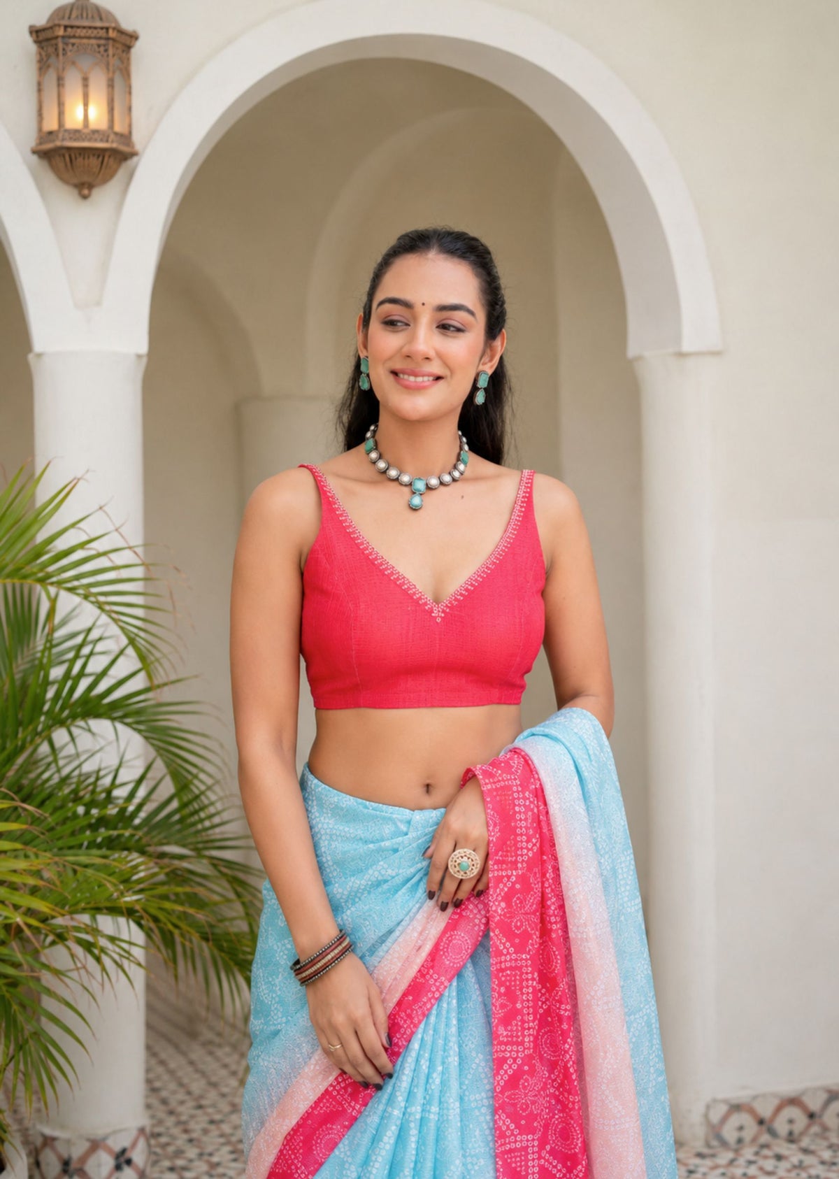 Firozi Red Kota Silk Saree Draped Pose - Bandhani Print Detail