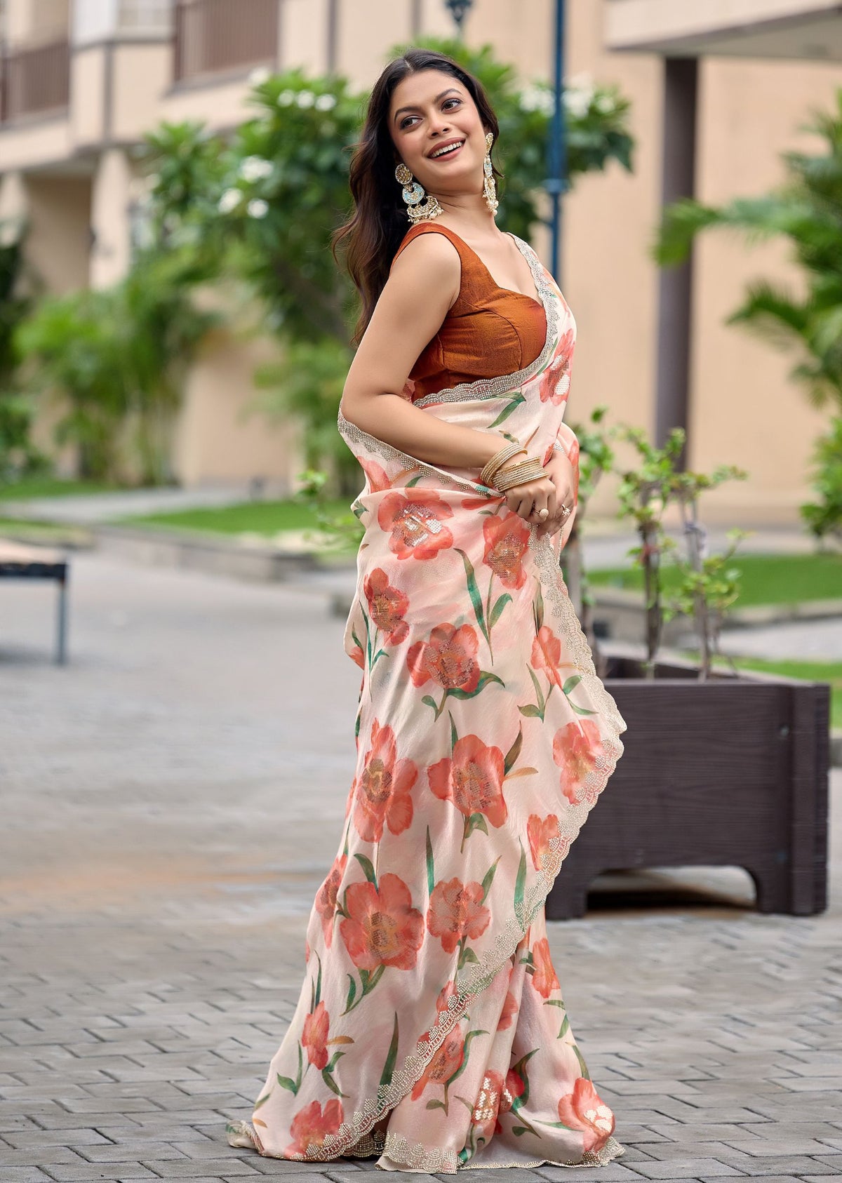 Orange Italian Silk Saree Draped Pose - Silver Embellished Border Detail