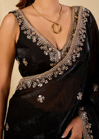 Elegant black organza saree with intricate embroidered border