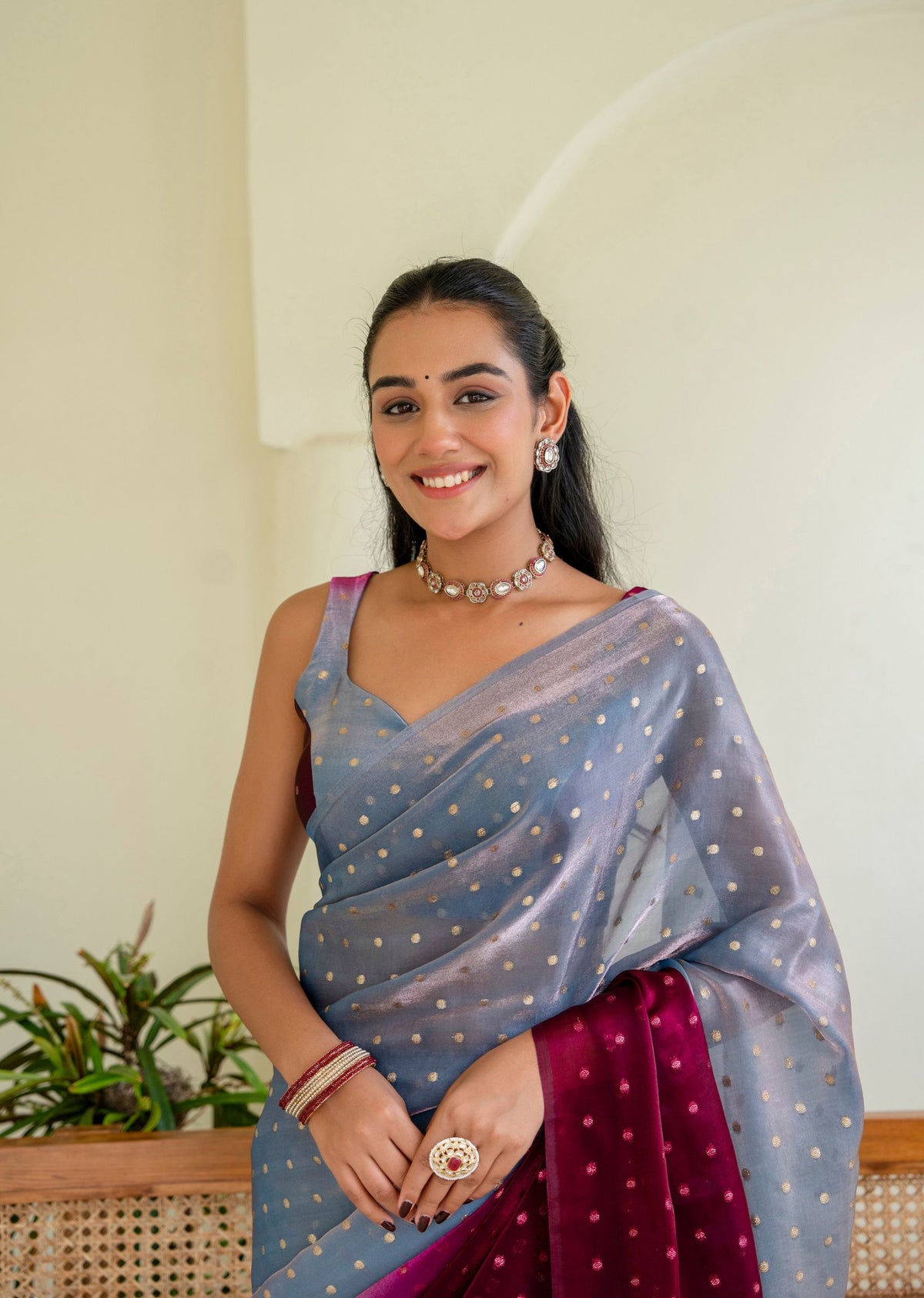 Royal Wine Grey Organza Silk Saree Standing Pose - Festive Wear Saree