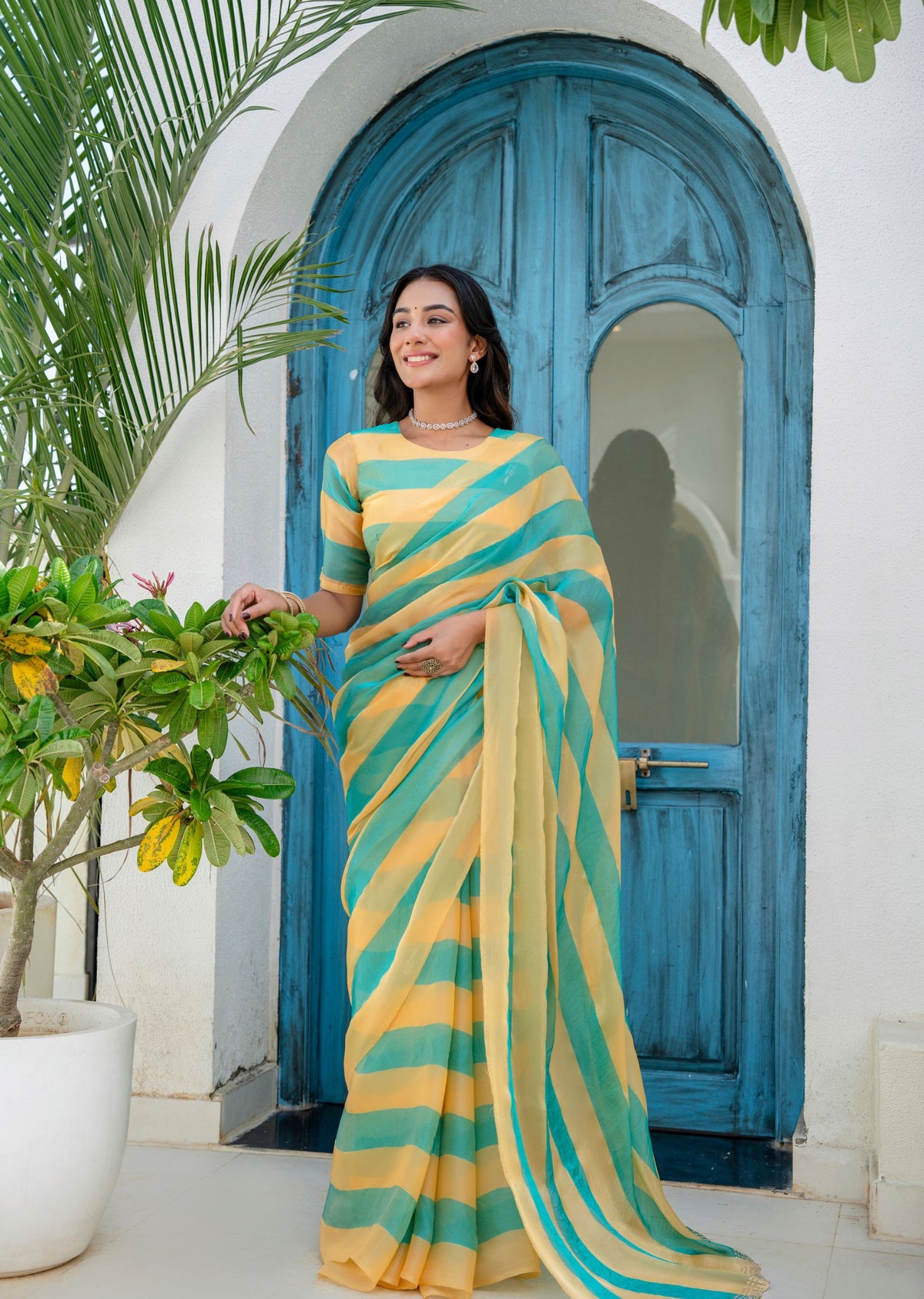 Sky Blue Organza Saree Standing Pose - Party Wear Saree
