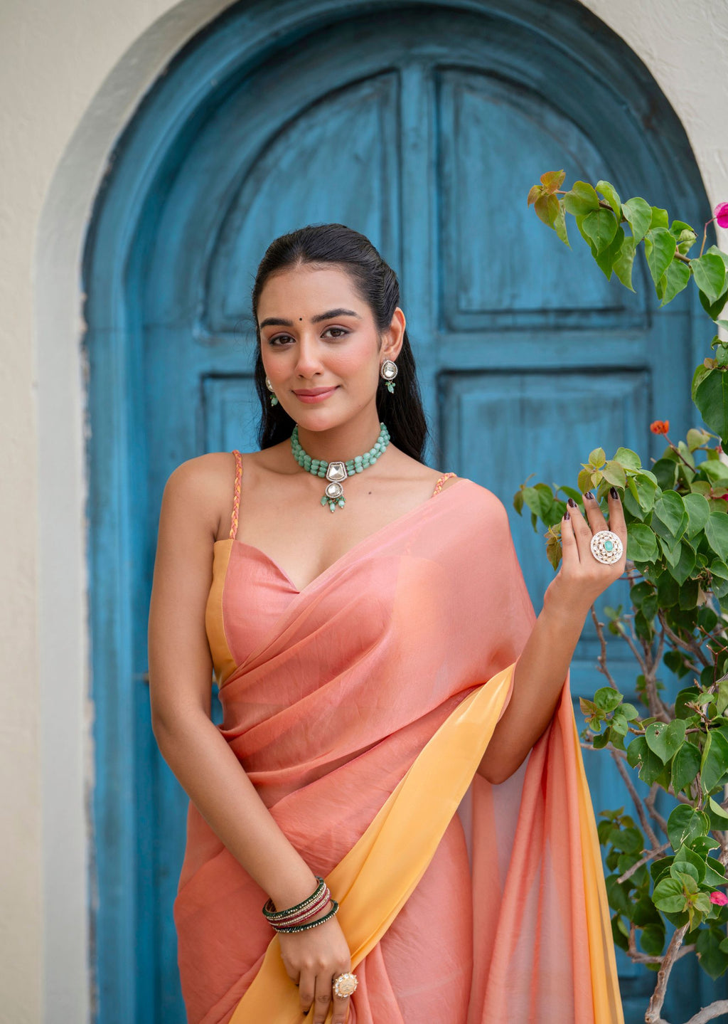 Peach Orange Organza Saree Standing Pose - Party Wear Saree