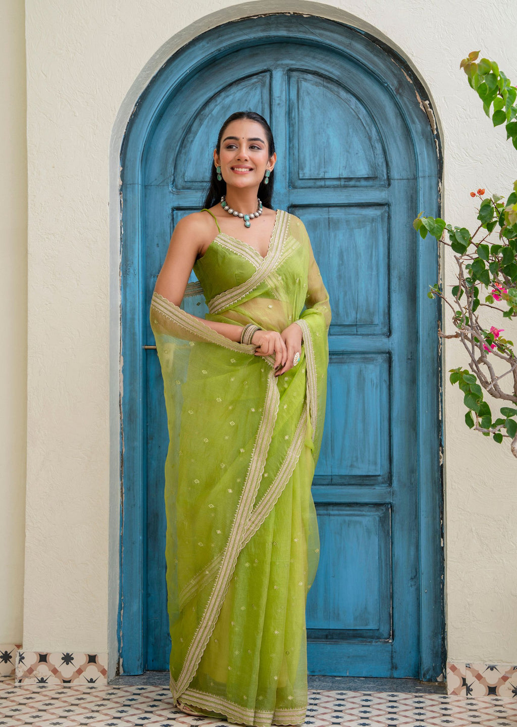 Lime Green Tissue Silk Saree Standing Pose - Festive Wear Saree