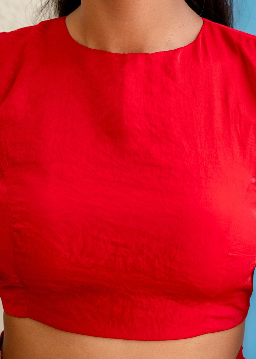 Red party wear chiffRed Italian Silk Saree Blouse Close Up - Embroidery Designon saree Blose