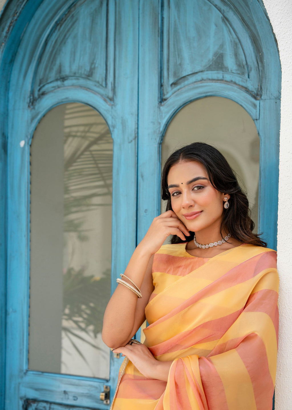 Orange Organza Saree Standing Pose - Festive Wear Saree