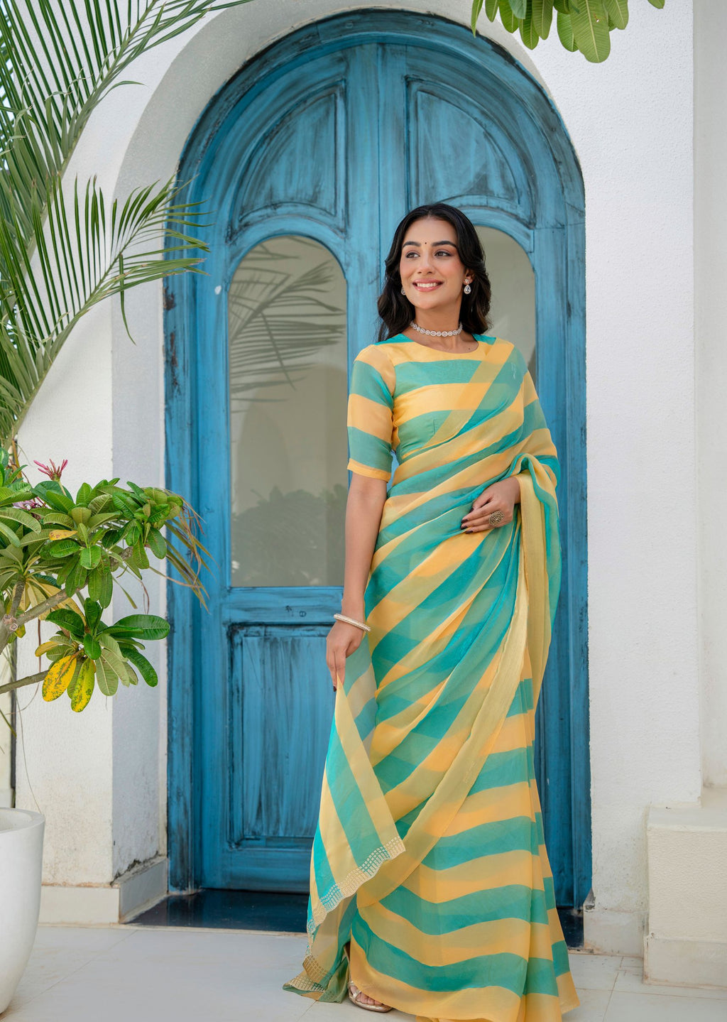 Sky Blue Organza Saree Styled Pose - Leheriya Stripes Detail