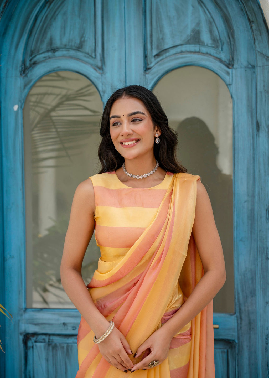 Orange Organza Saree Outdoor Styled Pose - Party Wear Saree