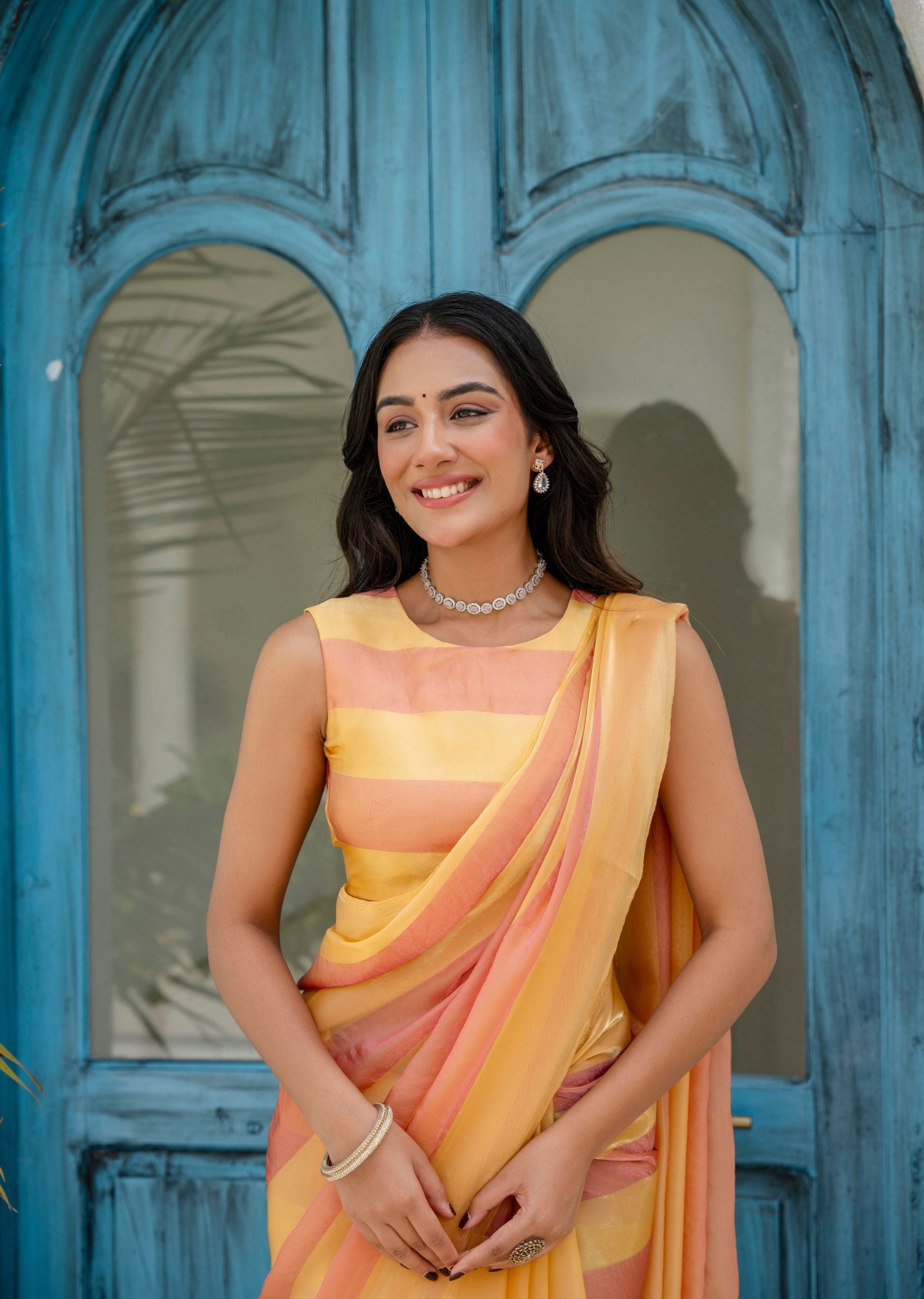 Orange Organza Saree Outdoor Styled Pose - Party Wear Saree