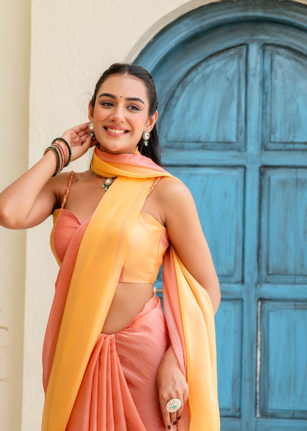 Peach Orange Organza Saree Draped Pose - Party Wear Saree