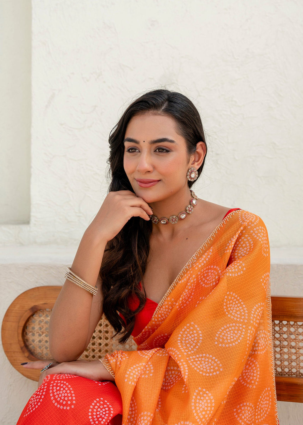 Orange Kota Silk Saree Seated Pose - Bandhani Print Detail