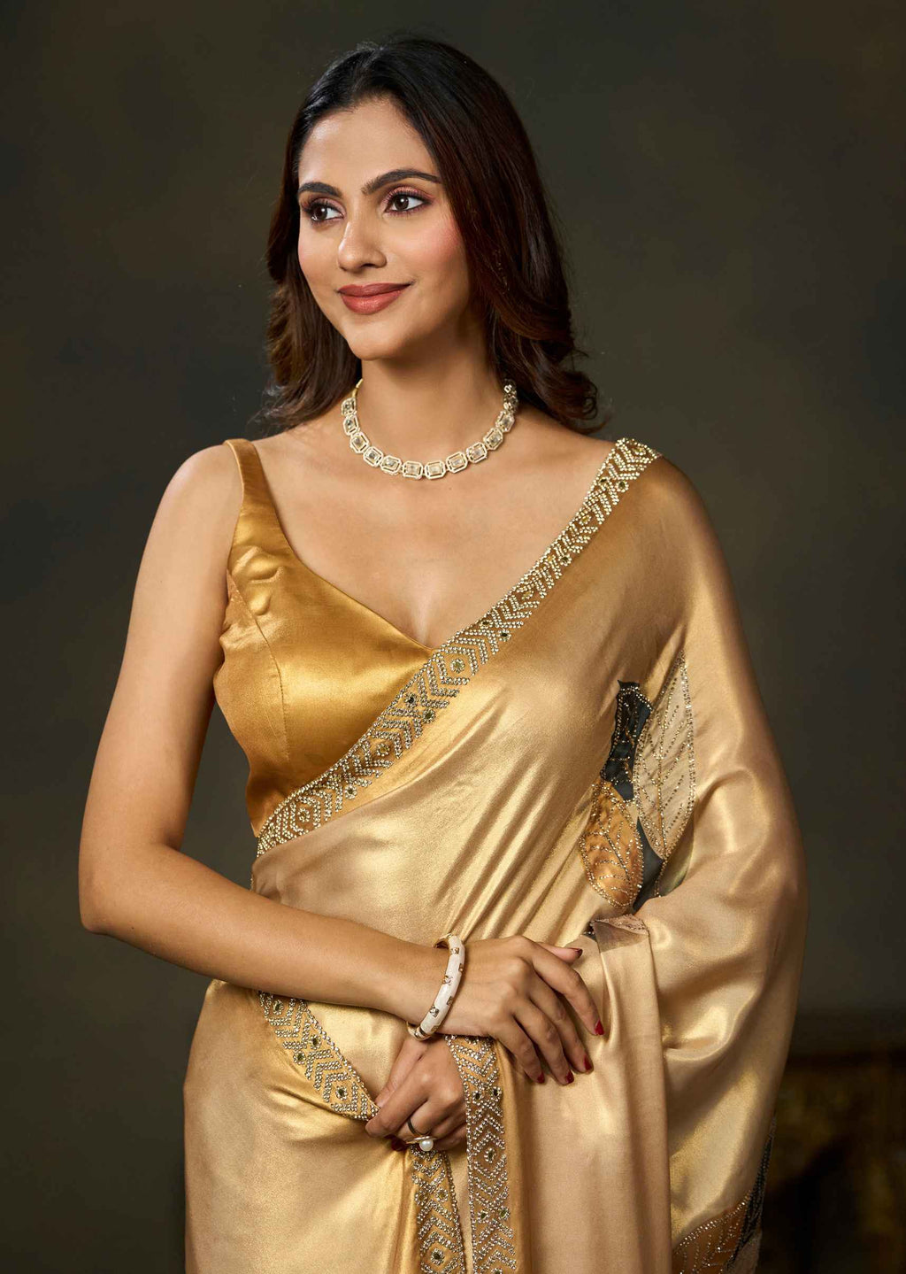 Golden Satin Silk Saree With Leaf Motifs And Embellished Border