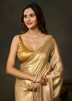Golden Satin Silk Saree With Leaf Motifs And Embellished Border