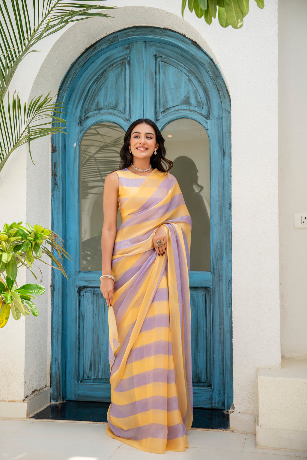 Purple Organza Saree Draped Pose - Golden Yellow Stripes Detail