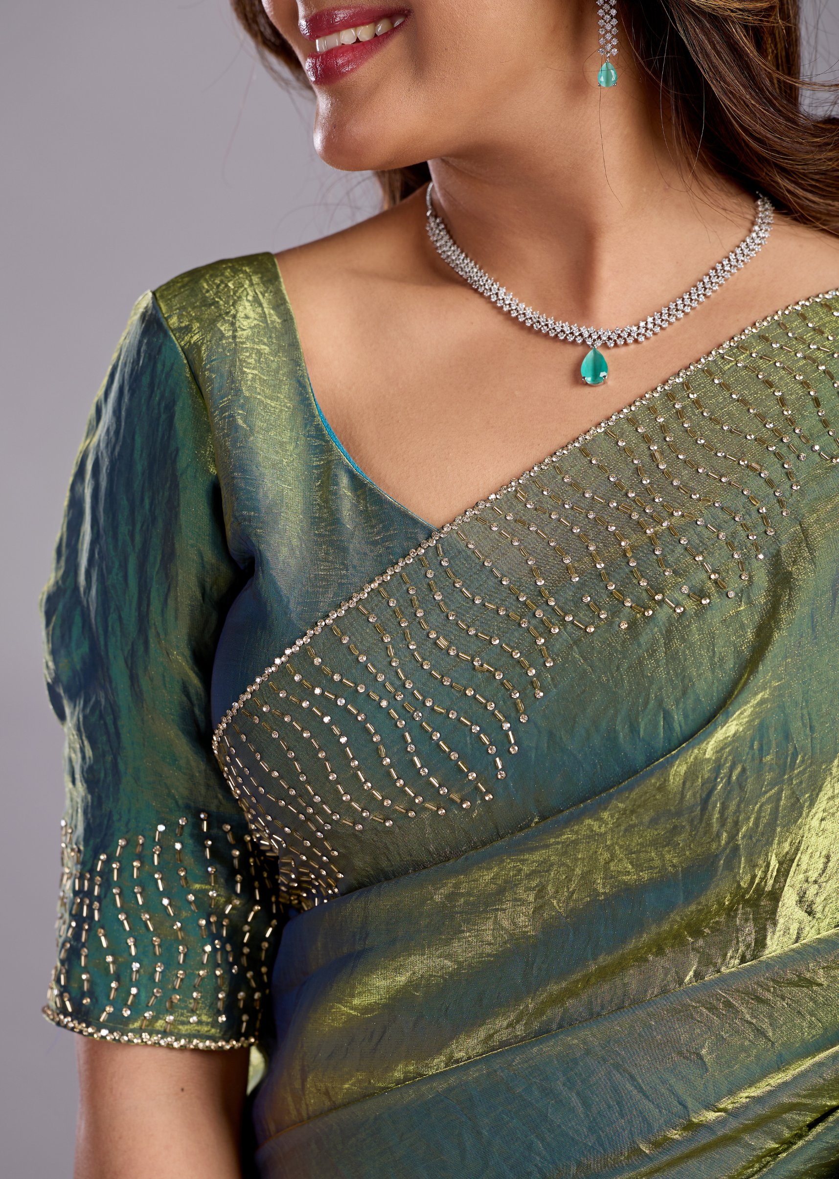 Olive Green Tissue Silk Saree With Stone Work