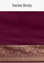 Dark Wine Crepe Silk Saree With Zari Border And Contrast Blouse