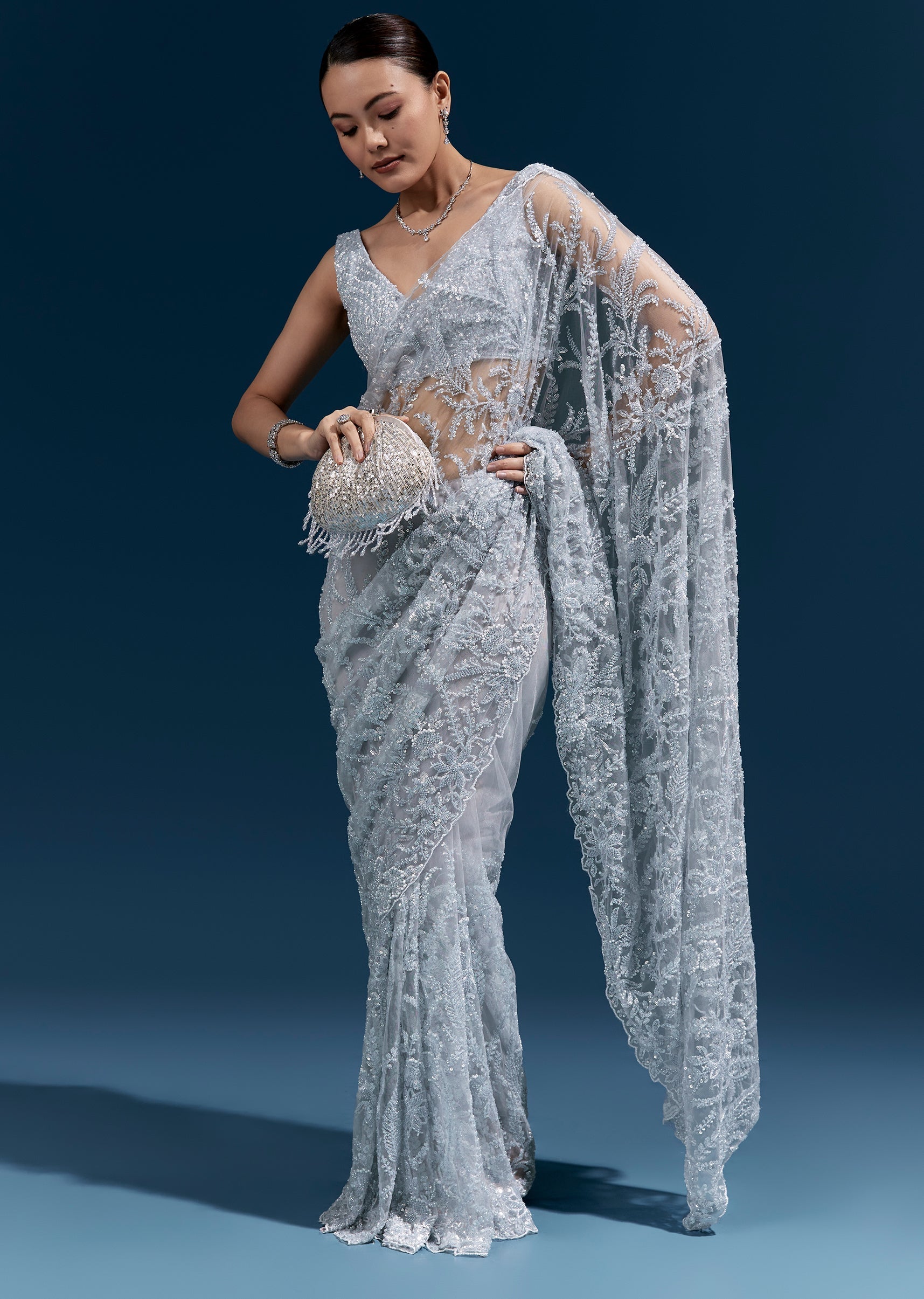 Ice Blue Heavy Embroidered Net Saree With Cutwork Border And All Over Floral Jaal