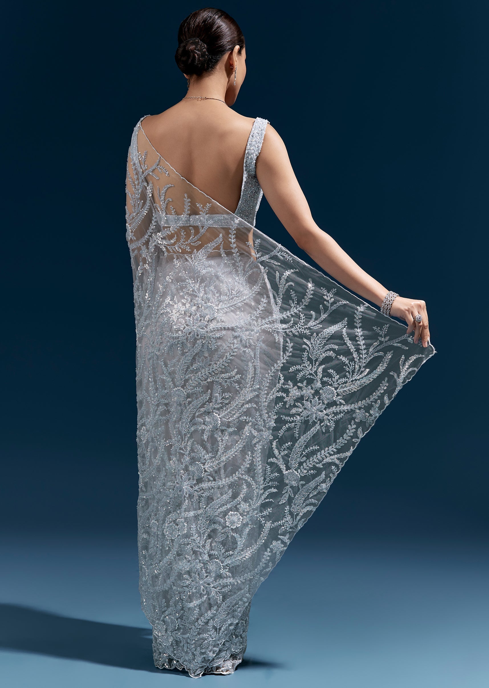 Ice Blue Heavy Embroidered Net Saree With Cutwork Border And All Over Floral Jaal
