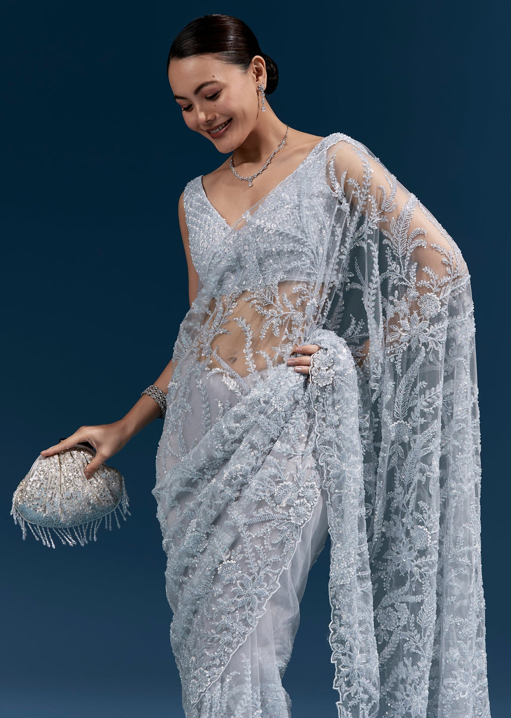 Ice Blue Heavy Embroidered Net Saree With Cutwork Border And All Over Floral Jaal